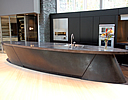 Elliptical shaped modern look concrete countertop